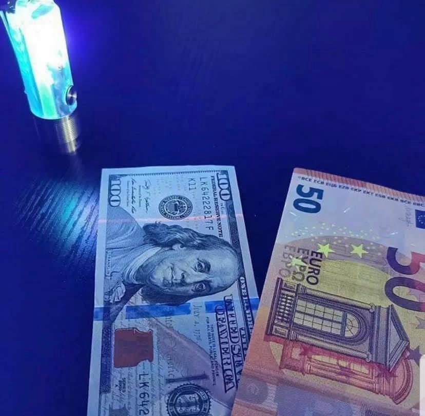 Stage Money vs Counterfeit Bills