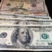 Who is a good contact for counterfeit money?